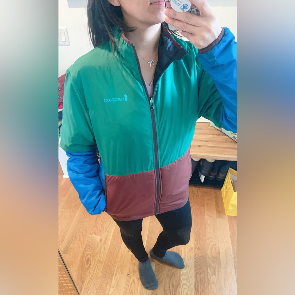 Cotopaxi reversible men Green, Blue, and Brown windbreaker with insulation.
